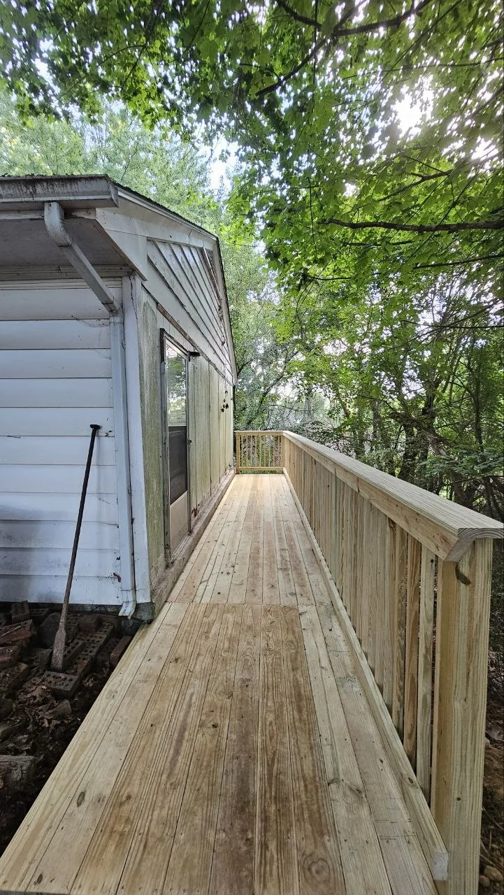 Long view down completed walkway next to home