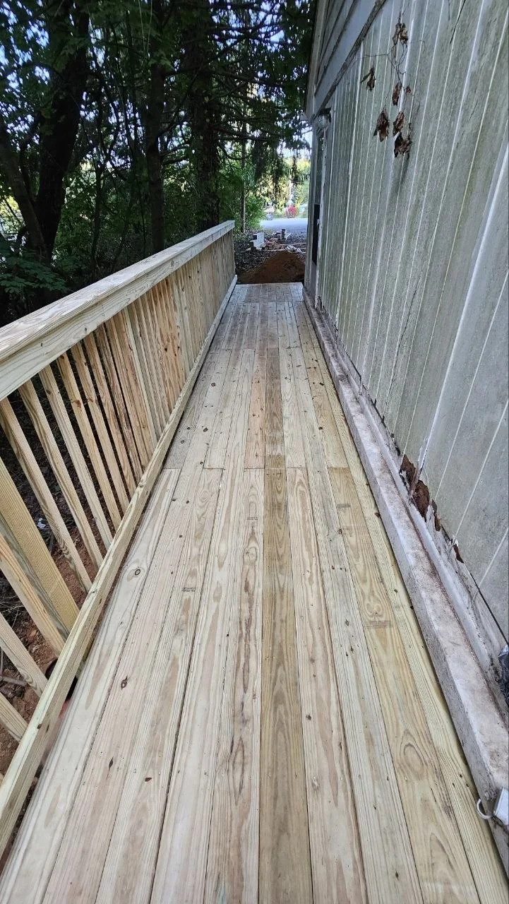 Pressure treated plank flooring and railing